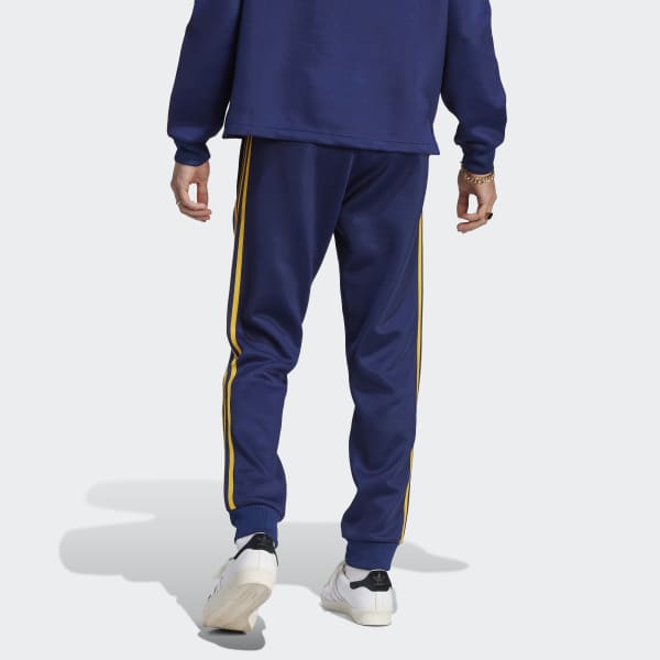 Blue and yellow best sale adidas track pants